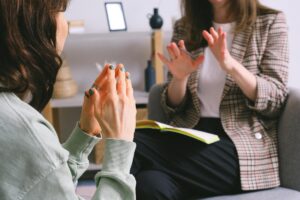 Woman being consulted about EMDR therapy as an options for mental health treatment