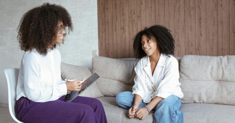 Therapist at We Conquer Together discussing different types of therapy for Eating Disorders.