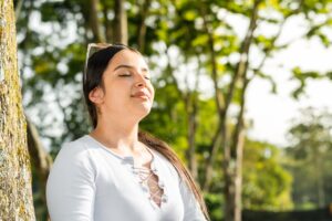 Woman practicing mindfullness for depression.