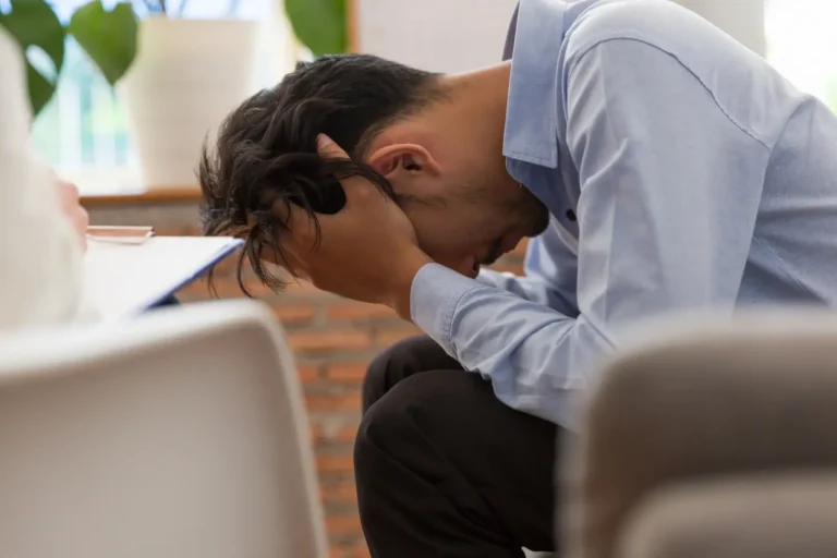 worried-man-with-head-in-hands-at-workplace-2026-03-26-08-10-52-utc